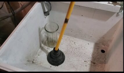 Clogged-or-slow-draining-utility-sink